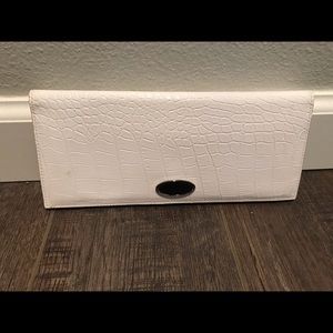 White House Black Market Travel Wallet. White.